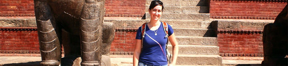 Ashley standing outside of a temple in Nepal