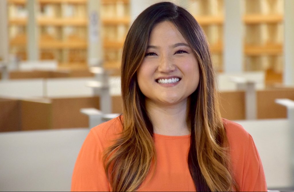 U of G alumna Esther Rhee wearing a big smile.