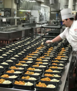 U of G chef making lots of take away meals