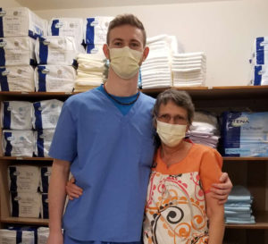 student helping at long term care facility