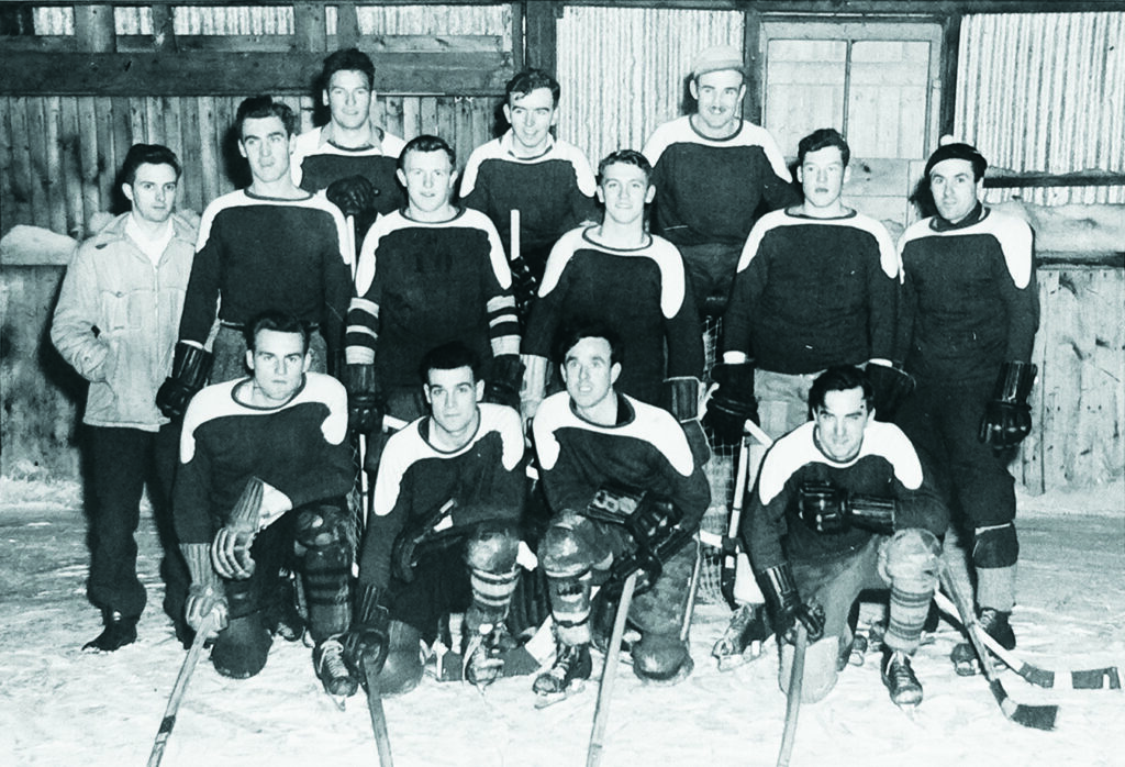 Members of the OVC ’51 hockey team celebrate their win in the 1947-48 OAC/OVC tournament.