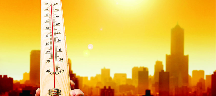 thermometer with hot city background