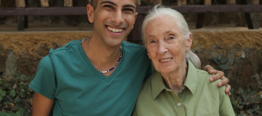man and woman smile at camera