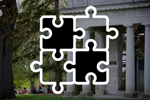 Photo of people sitting beside the Portico with an icon of four attached puzzle pieces
