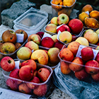 Apples in plastic containers