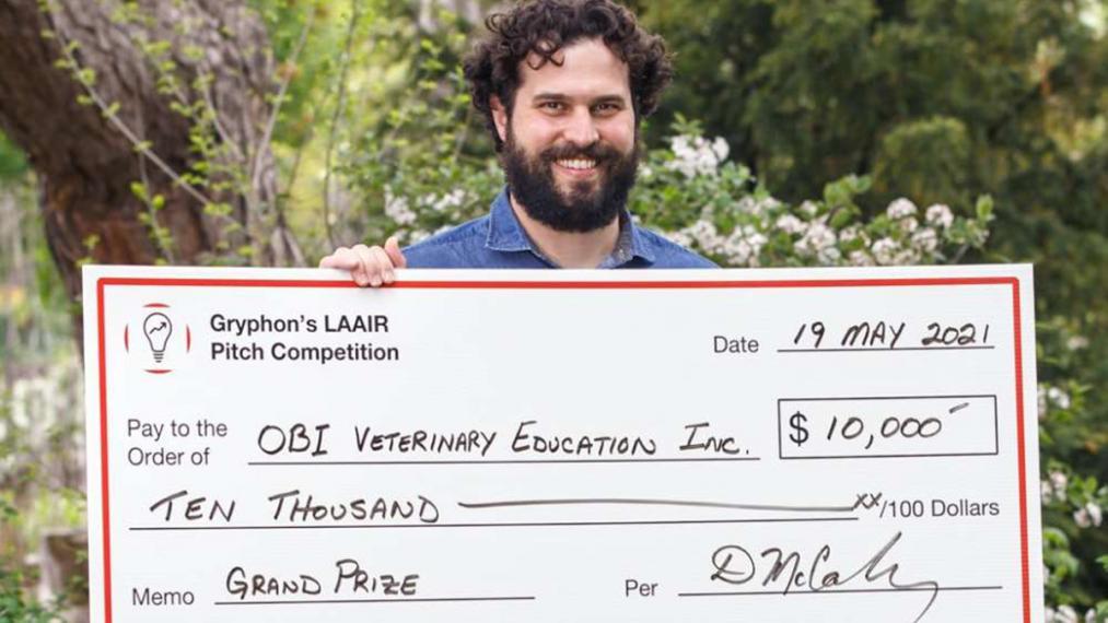 Obi Veterinary Education co-founder Dr. Ryan Appleby with Grand Prize Award cheque