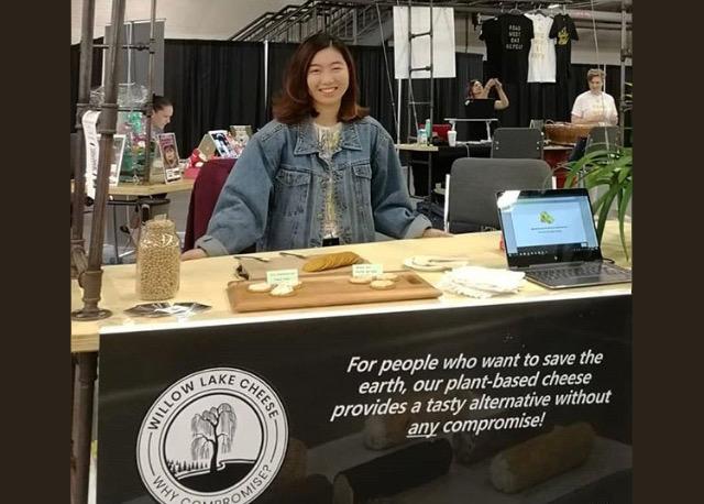 Jane Ong at the Willow Lake Cheese trade show booth.