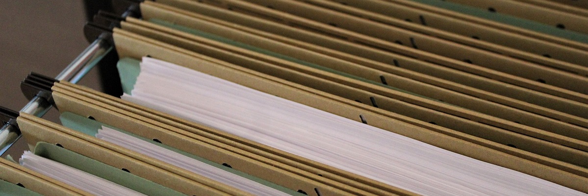 Close-up of file folders with documents