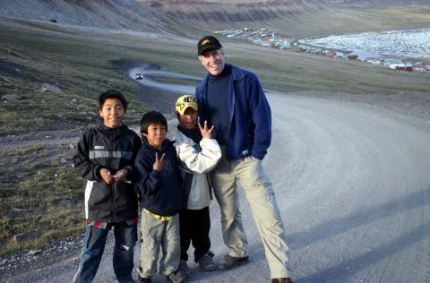 Photo of Barry Smith with three children in a Northern setting