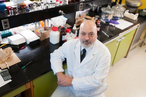 Mario Monteiro sitting in a lab