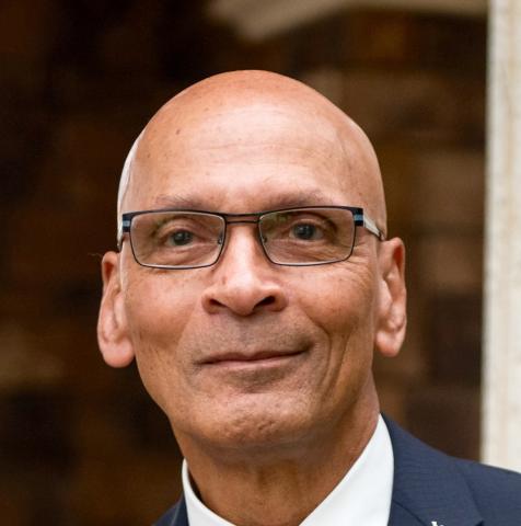 A headshot of Dr. Carlton Gyles