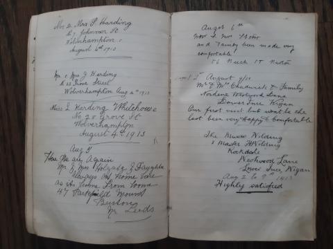 An open book with handwritten notes