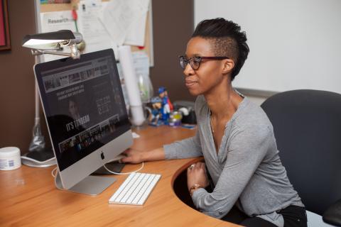 Photo of Tamara Small looking at her computer