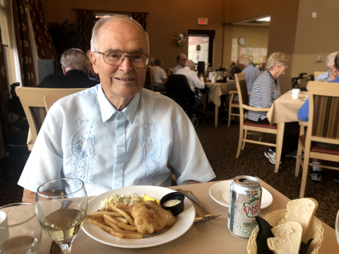 older male eating at a restaurant