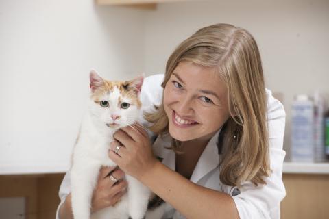 close-up of Adronie Verbrugghe holding a cat