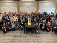 A group of University of Guelph stakeholders and industry professionals posing together for Soils at Guelph fifth anniversary event.