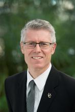 A headshot of Malcolm Campbell