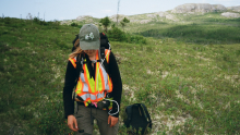 A U of G student scouts for a fungal disease on blueberry as part of an ongoing study on land cover in the traditional territory of the Miawpukek First Nation, Newfoundland.