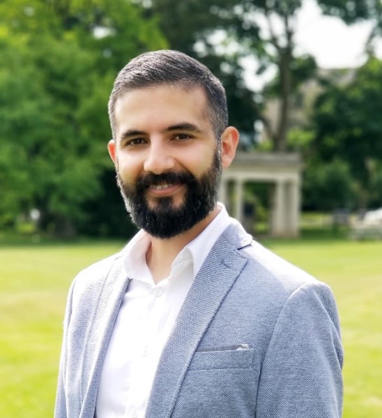 Afshin Ashari with UofG Portico in background.