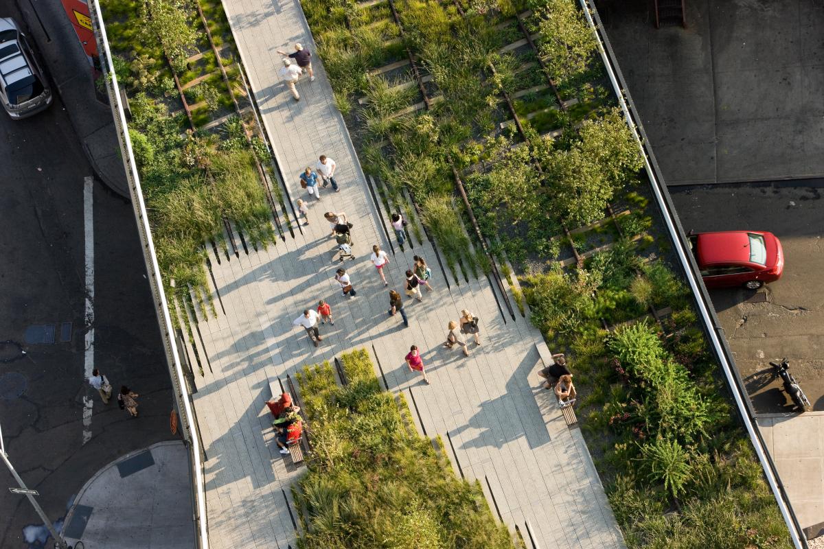 Aerial view of people walking on elevated walk way