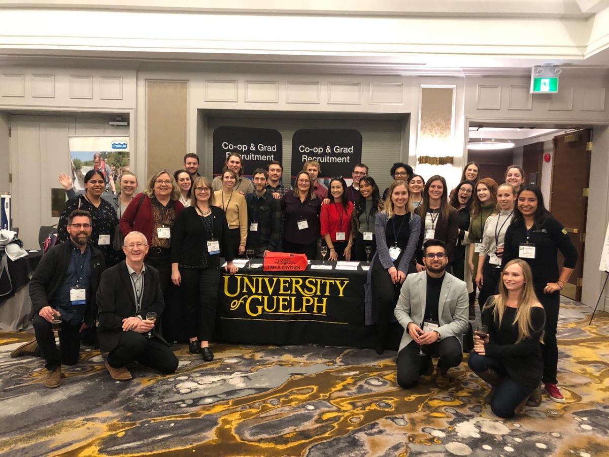 Students and faculty around UofG table at Latornell Conference