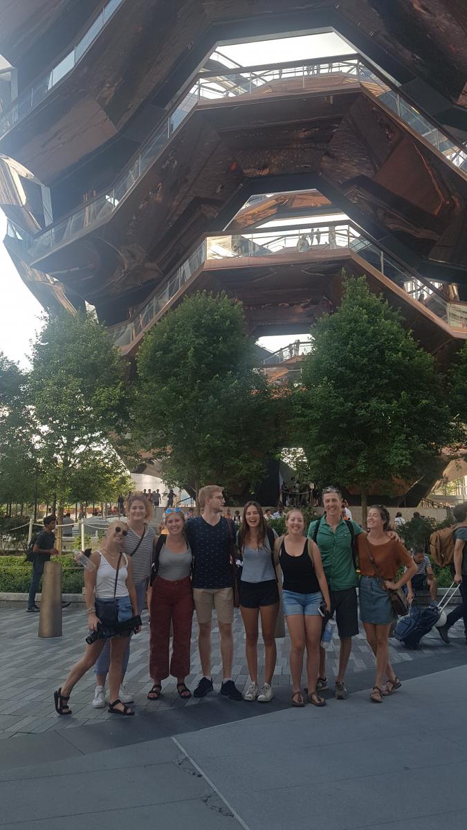 Students standing in front of The Vessel in Hudson Yards