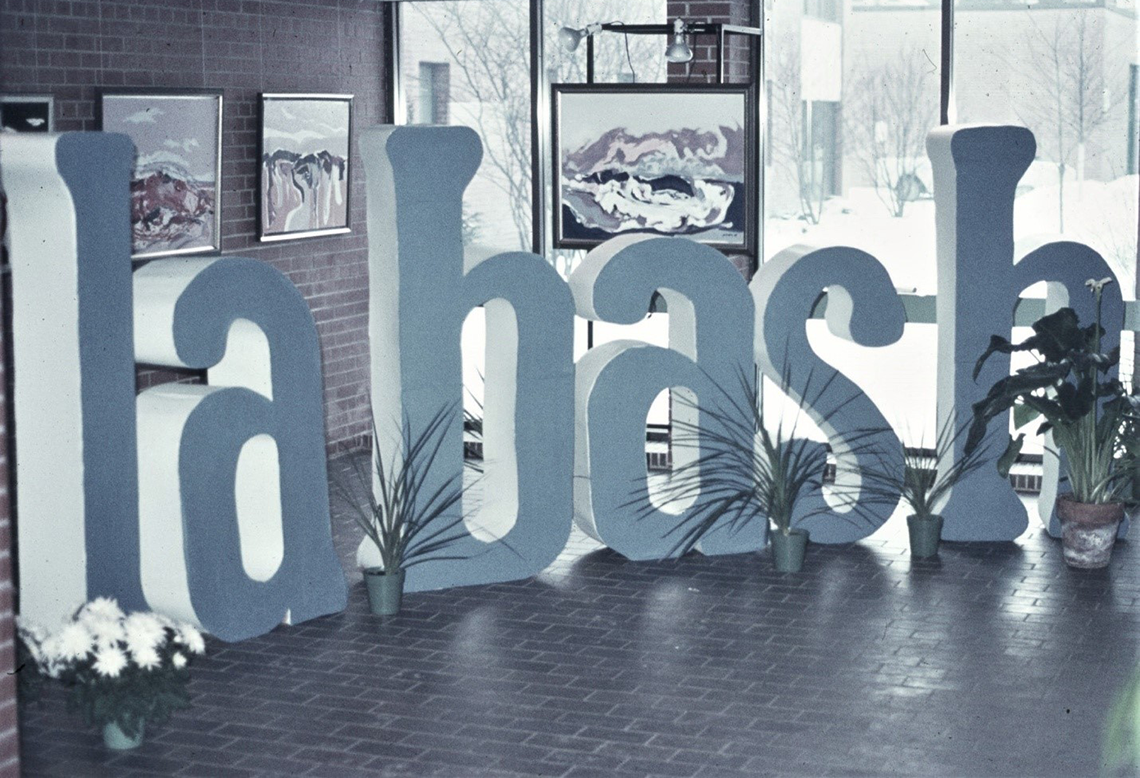 Large LABASH letters up in building foyer