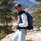 Randy Gimblett hiking on a mountain