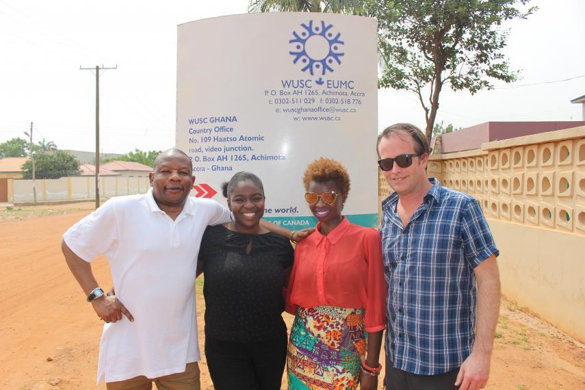 Office staff in front of the World University Services of Canada Office in Ghana