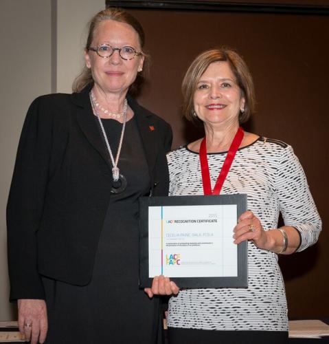 Cecelia Paine receiving LACF award from Wendy Graham