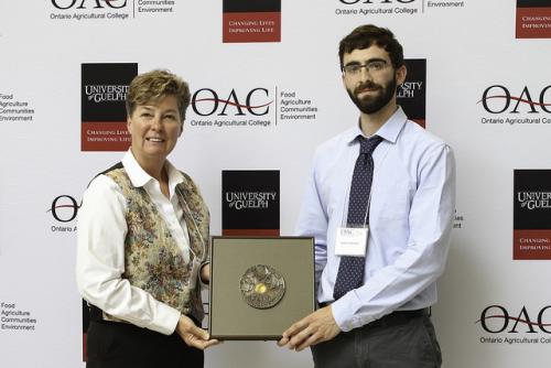 Linda Irvine presenting Chanasyk Medal to Scott Cafarella