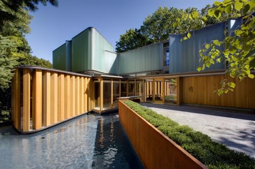 Glass House Surrounded by Trees