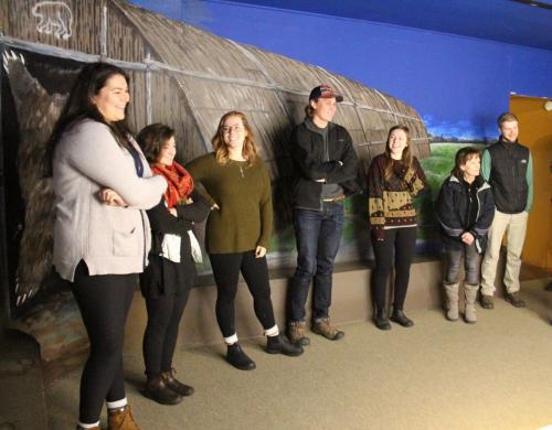 Students gathered around exhibit at Woodland Cultural Centre
