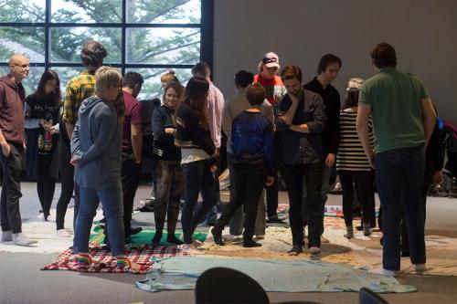 students participating in Kairos blanket exercise