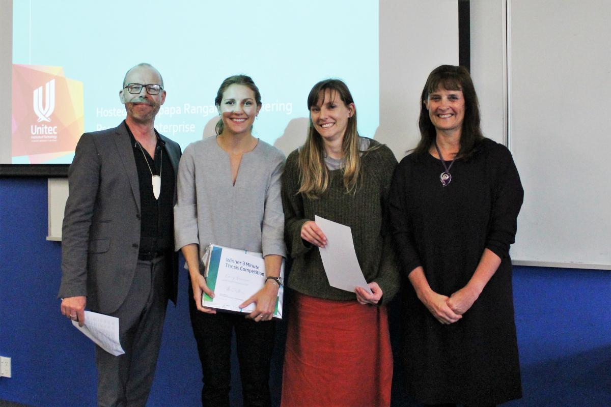 Three students receiving awards