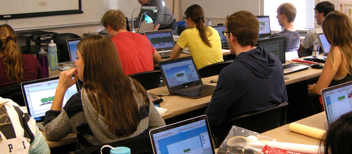 Students Using Computers for Graphic Workshop