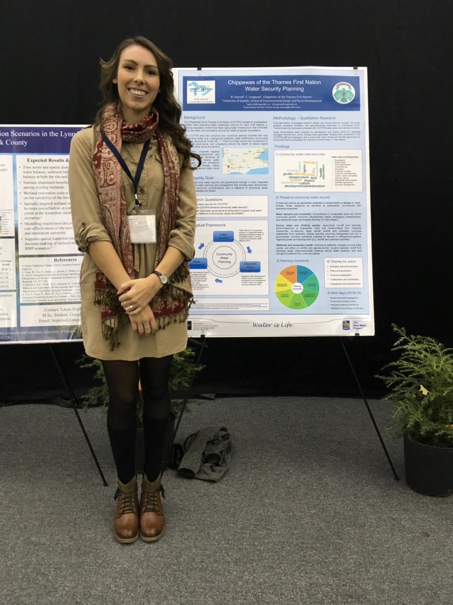 Natalya Garrod standing in front of her Latornell poster board