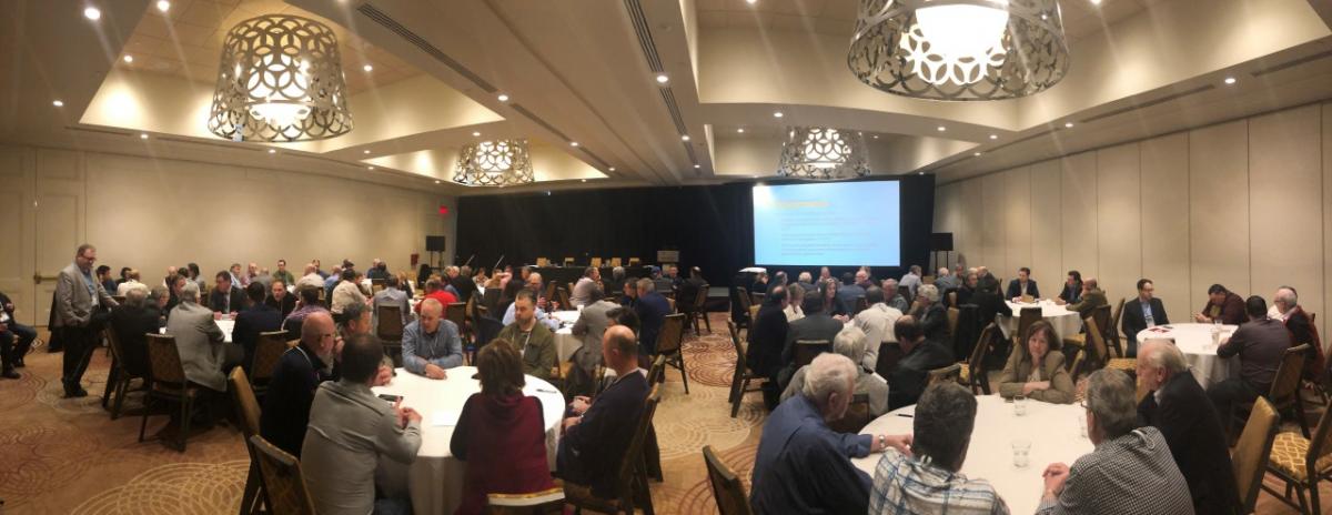 People attending the OGRA 2019 conference in the conference room